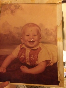 What's making me happy this week: Hubby just walked in to show me this baby picture of his. We have VERY few pictures of him as a kid, so this made me smile, particularly seeing O's lop sided dimple in Darrell's baby face. :) 
